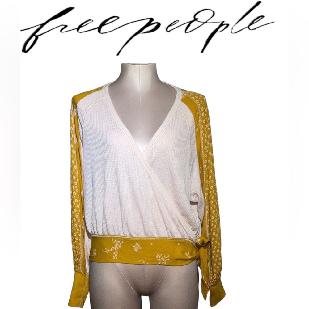 Free People long sleeve top. Size XS. Beautiful detail on sleeves
